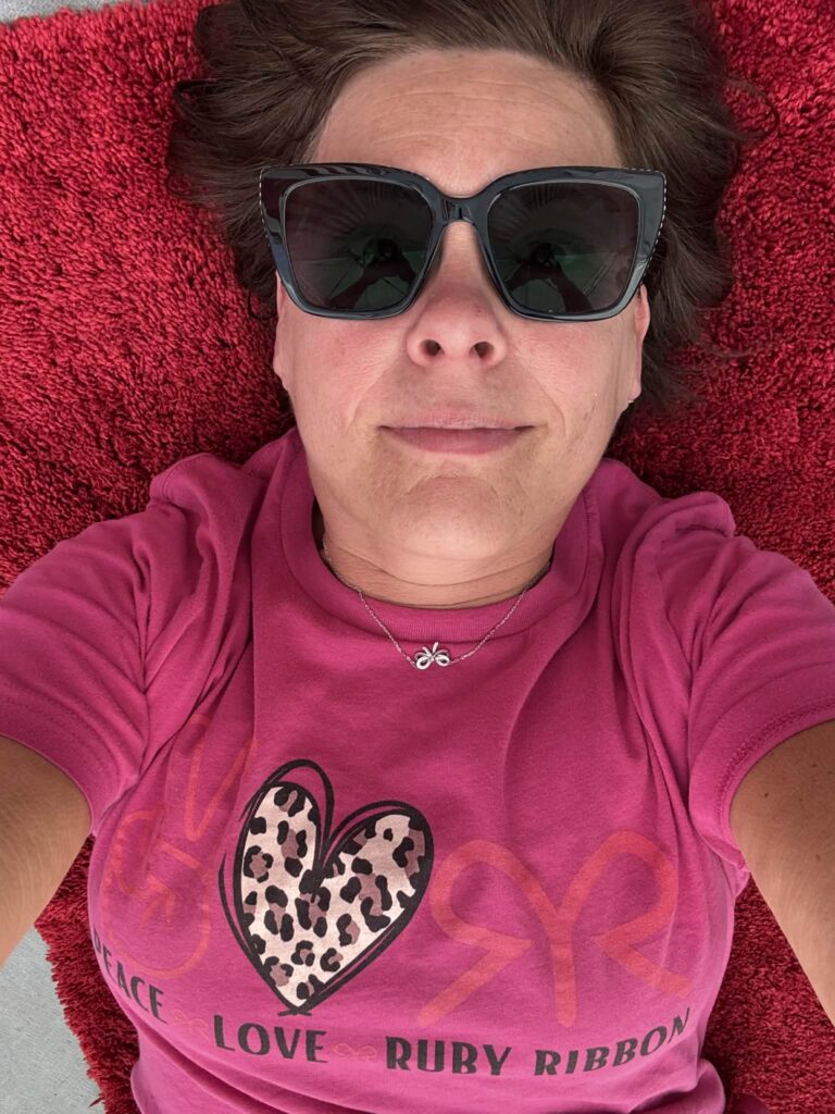 Royanna in her Ruby Ribbon shirt, July 4th 2024 — days after the closing announcement, not yet knowing what God had already prepared