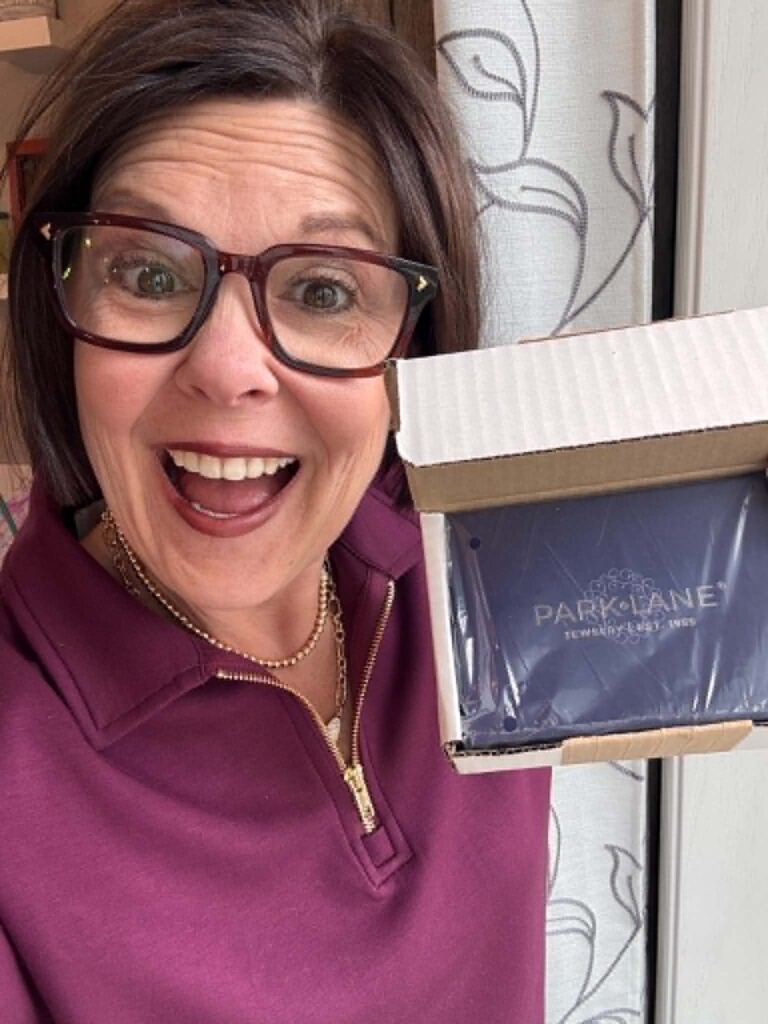 Royanna celebrating a Park Lane Jewelry delivery — because accessories should feel this good!
