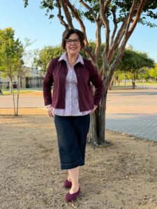 Petite style after 40 showing ankle-length pants, low-vamp shoes and a visible waistline on a 5'2" woman.